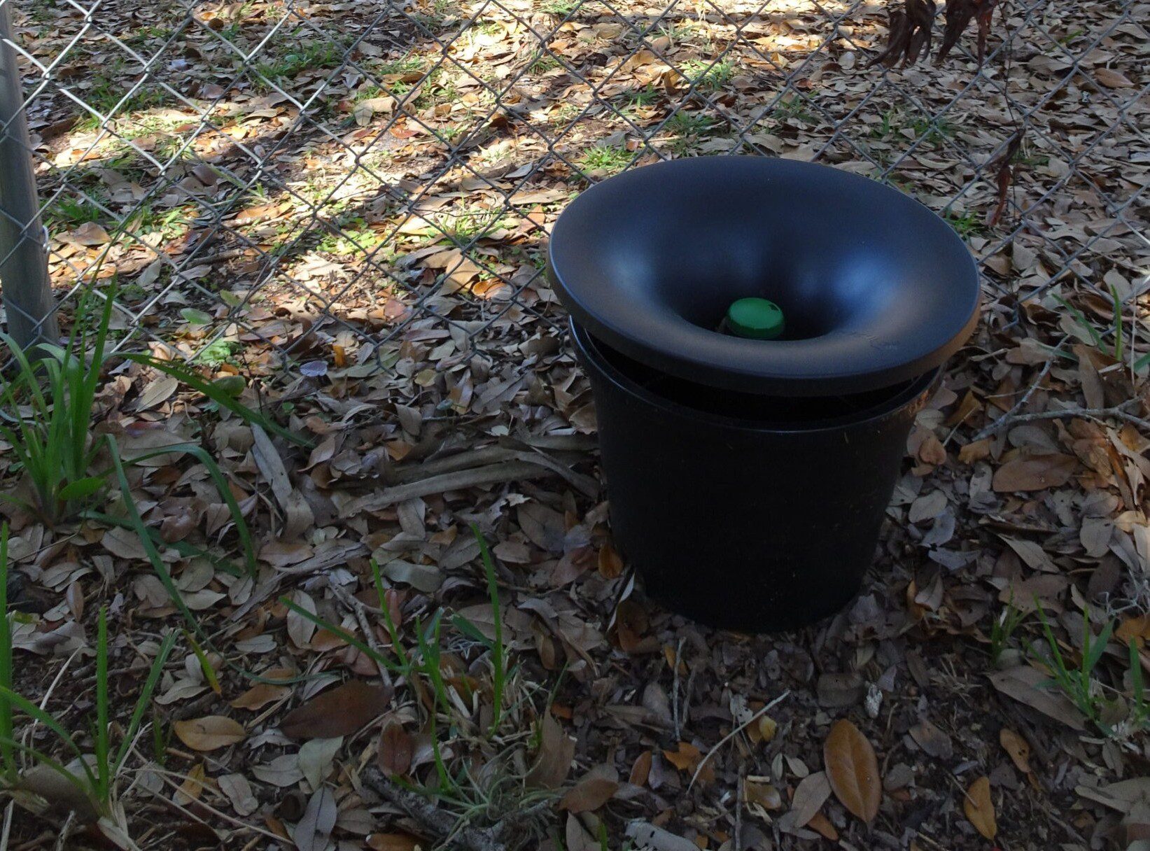 In2Care mosquito trap which lures mosquitos to be killed by a fungus treatment and spread a larvae killing treatment to other breeding sites.